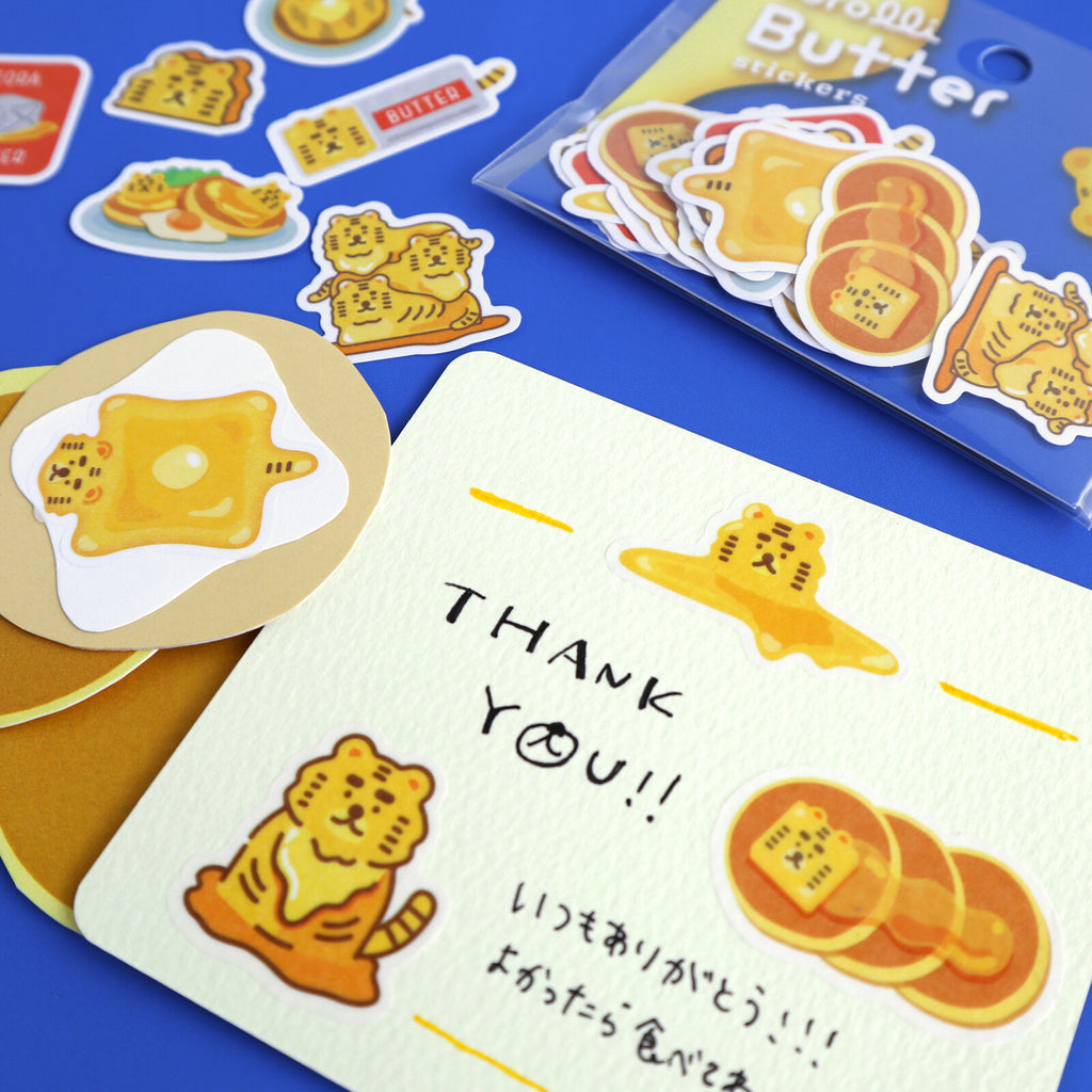 Close up of tiger butter stickers on a thank you card