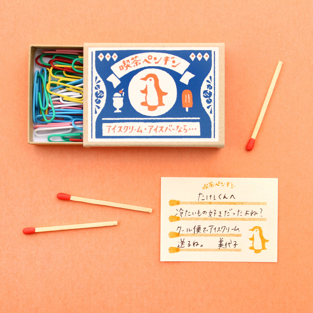 Penguin-themed memo box from Furukawa Shiko Retro series with colourful paper clips
